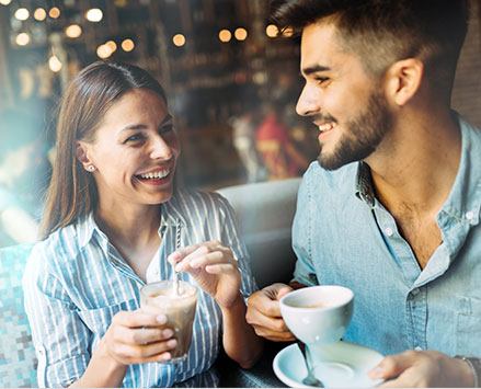 the young uses paper straws for comsuming coffee