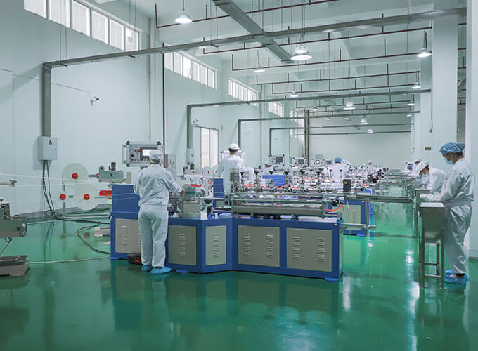 a production line showing different stages of paper straw manufacturing