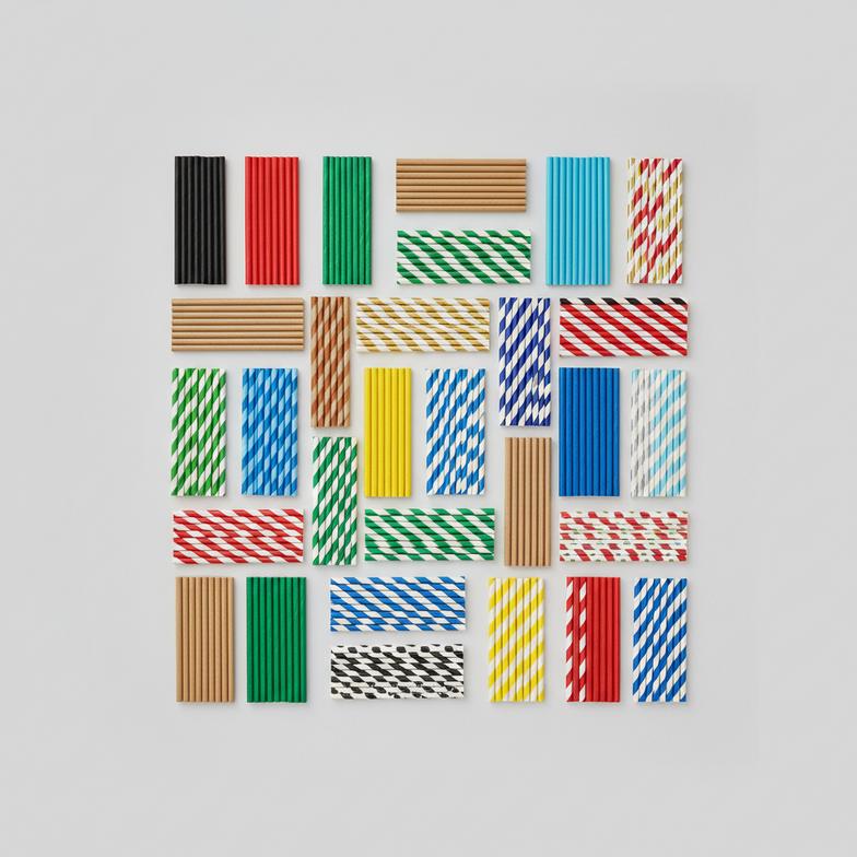 A variety of colorful cocktail paper straws arranged for selection