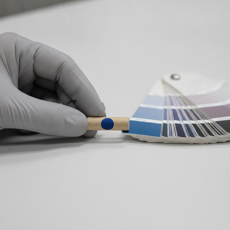 Comparing a Pantone color swatch to the final printing quality on custom hemp filter tips