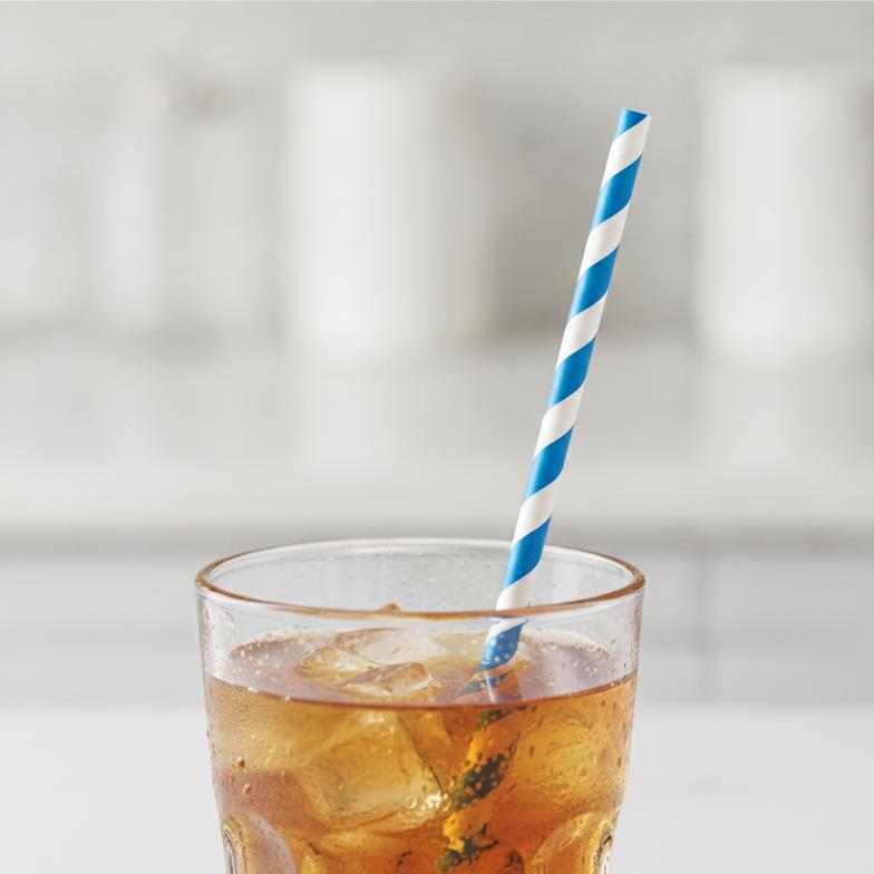 A high-quality paper straw standing firm in a cold drink after several hours