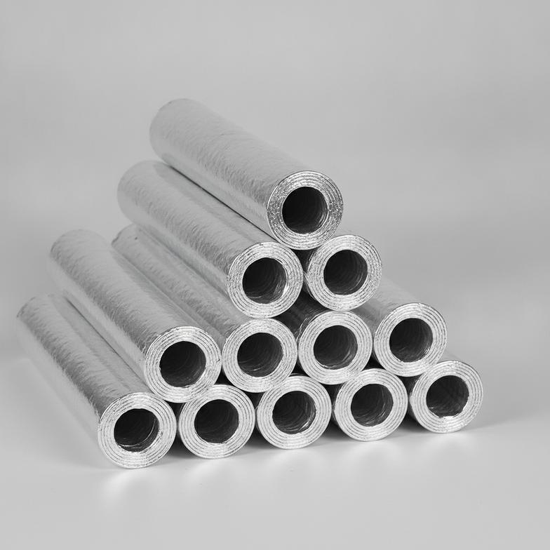 Close-up of several firework paper tubes wrapped in shiny aluminum foil